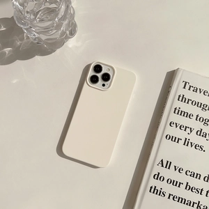 Macro shot of matte off-white silicone phone case for iPhone with full camera protection