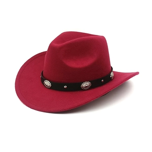 Close-up of wine red cowboy hat featuring silver engraved metal studs on black band