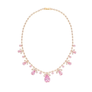 Collier de luxe doré avec zircons roses en forme de goutte et accents floraux