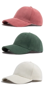 Vertical flat lay of fleece baseball caps in pink, forest green and off-white colors
