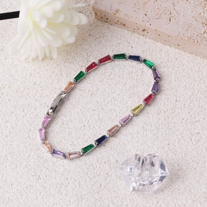 Colorful rectangular zircon tennis bracelet with silver finish on elegant white background