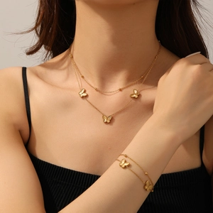 Collier Et Bracelet Élégants En Acier Inoxydable À Plusieurs Rangs Avec Pendentifs Papillon Texturés Et Petites Perles Pour Femmes