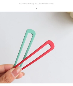 U-shaped hairpins in matte mint green and red for elegant bun styling and updos