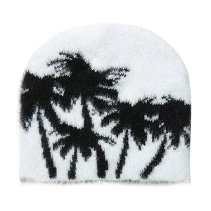 Plush faux mink knitted beanie for women featuring a black coconut tree jacquard pattern