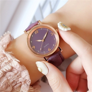 Luminous quartz watch for women with purple dial and rose gold case on leather strap