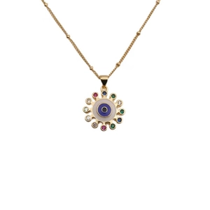 Detailed shot of gold evil eye pendant with vibrant colorful zircon stones on thin chain