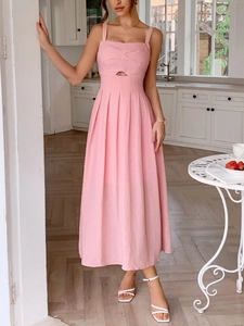 Detailed close-up showing the hollow out design below the bust of the pink summer dress