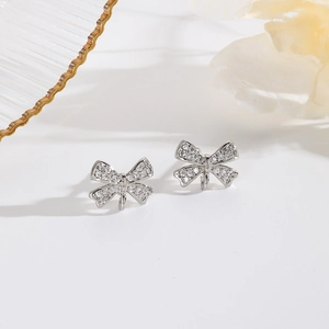 Sparkling silver bow knot stud earrings with cubic zirconia for DIY jewelry making