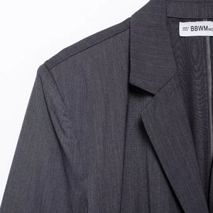 Dark gray urban commuter blazer with notch lapel and fine woven texture details