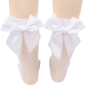 Close-up of girls white mesh socks featuring a large satin bow on the ankle