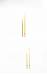 Close-up of golden brushed metal clock hands set model 969 for quartz movements