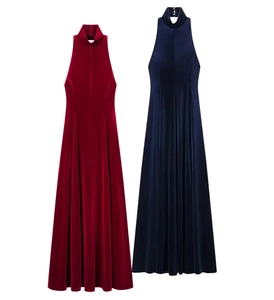 Detail view of backless halter maxi dress in deep red and navy blue glossy velvet