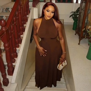 Detail of elegant dark brown halter neck maxi dress featuring a slim-fit open back design