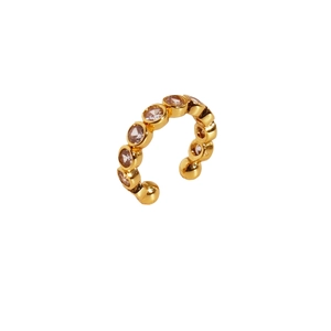 Minimalist gold ear cuff earring with purple zircon stones on white background