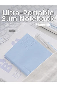 Close-up of slim light blue PU leather planner with embossed Plan Plan logo on a white desk