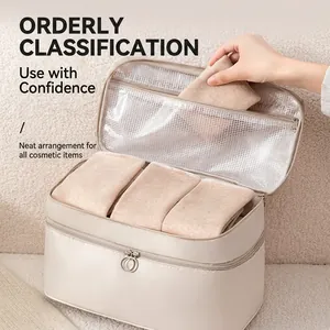 Portable travel underwear organizer bag with double zipper and mesh pocket in cream white