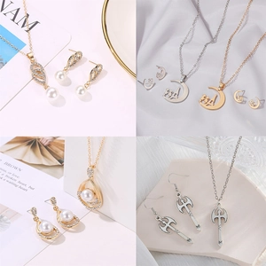 Elegante Strass-Perlen-Schmucksets mit floralen und geometrischen Halsketten und Ohrringen