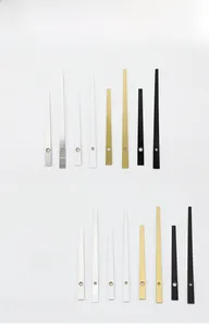 Detail of quartz clock needles set in gold, silver, black, and white colors for DIY repair