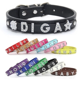 Close-up of DIY PU leather pet collars featuring rhinestone alphabet letters and charms