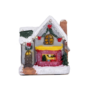 Luminous Christmas snow house miniature with LED lights and festive roof decorations