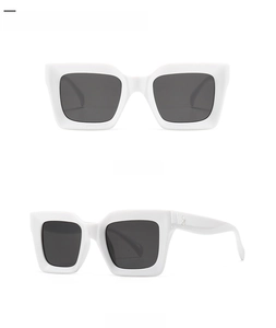 Detailed front and side views of thick white square sunglasses with silver rivets