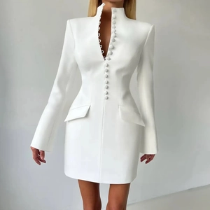 Detailed view of white slim fit mini dress with stand collar and cloth-covered buttons