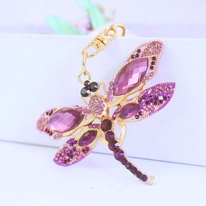 Exquisite gold dragonfly keychain with purple crystals and sparkling rhinestones for bags