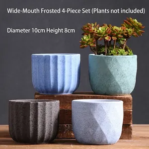 Set of 4 matte ceramic succulent pots with vertical stripes in 10x8cm modern design