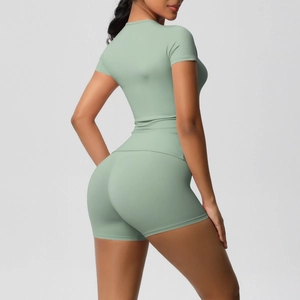 Close-up of light green seamless yoga set showing high elasticity and back detail