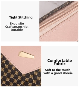 Detail of pink and brown leather stitching with clover print and gold metal plaque