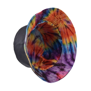 Detail view of double-sided bucket hat with vibrant tie-dye pattern and reinforced stitching