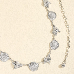 Vintage silver body waist chain featuring starfish and shell charms for beach beachwear