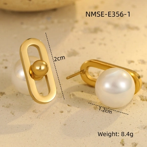 Detailed macro view showing a 2cm gold oval earring with a 1.2cm white pearl inlay