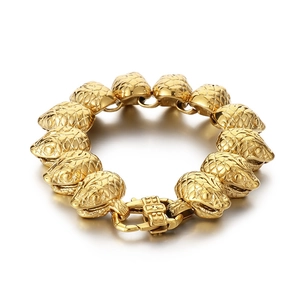 Chunky gold titanium steel punk bracelet with linked snake head modules in circular layout
