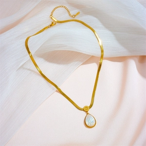 Gold water drop pendant necklace in titanium steel featuring Love engraving on shell inlay