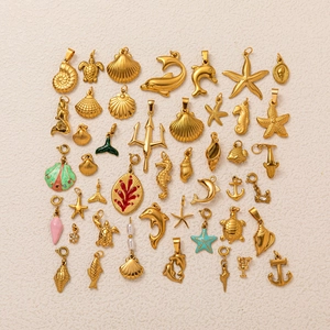 Detailed collection of 18K gold plated starfish shell and ocean pendants for DIY jewelry