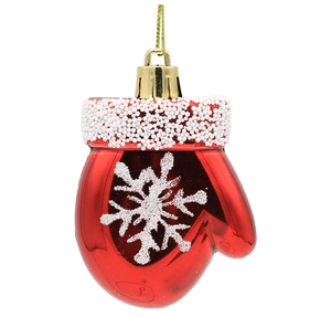 Detailed view of red Christmas mitten ornament with white glitter snowflake and gold string