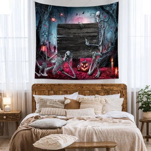 Detailed view of Halloween tapestry with skeletons and pumpkins on bedroom wall background