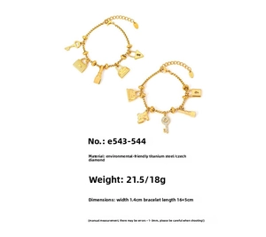 Detailed specs of titanium steel gold bracelet with cubic zirconia charms and key pendant