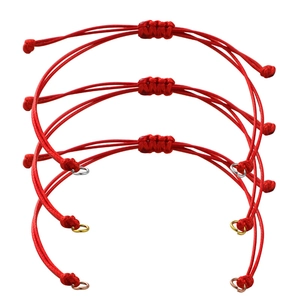 Adjustable 0.8mm red wax cord woven bracelet with gold and silver metal ring accents