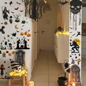 Detail of Halloween wall decals featuring pumpkins, bats and ghosts on a hallway wall