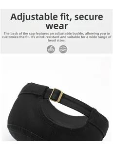 Detail showing the adjustable copper metal buckle and cotton twill strap of the black cap