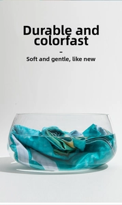 Close-up of striped beach towel in a water glass showing fade-resistant fabric durability