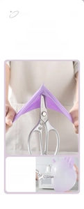 Detail of durable purple nitrile gloves showing high stretch and puncture resistance test