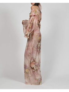 Detailed back view of pink floral chiffon off-shoulder top and wide-leg trousers set
