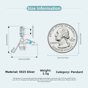 Detailed size view of S925 sterling silver toothbrush and tooth pendant set next to a coin