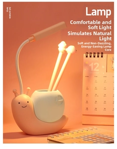 Detail view of snail-shaped LED desk lamp with orange pen holder and flexible hose
