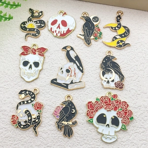 Gothic gold alloy enamel charms featuring skull, snake, and moon motifs for DIY jewelry