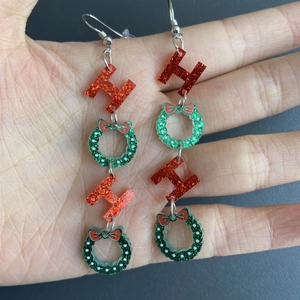 Colorful acrylic Christmas earrings with red glitter H letter and green wreath design
