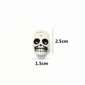 Mini resin skull beads for Halloween DIY crafts with 2.5cm height and 1.5cm width specs